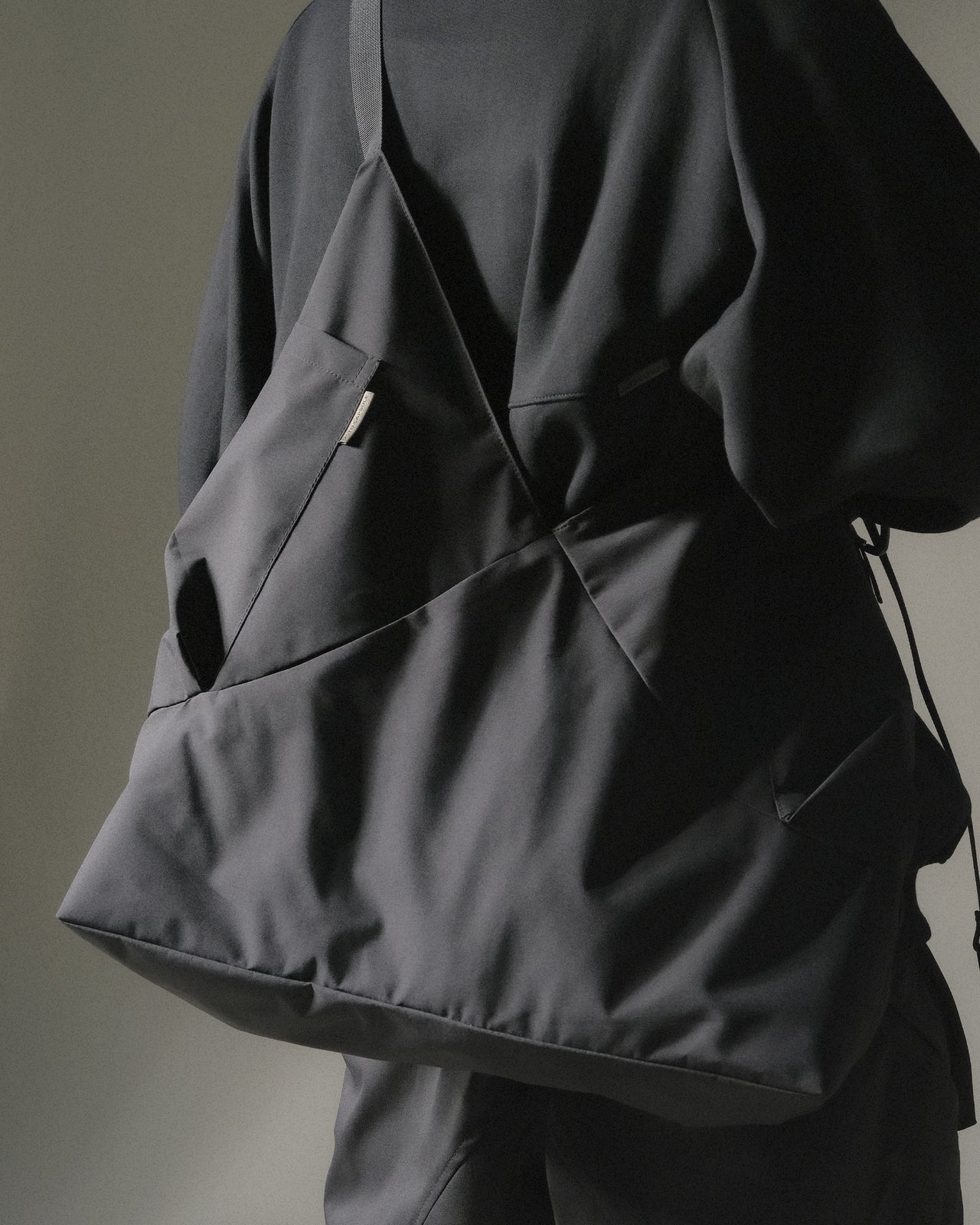 OCTO GAMBOL® -  Aura X-Curved Crossbody Bag