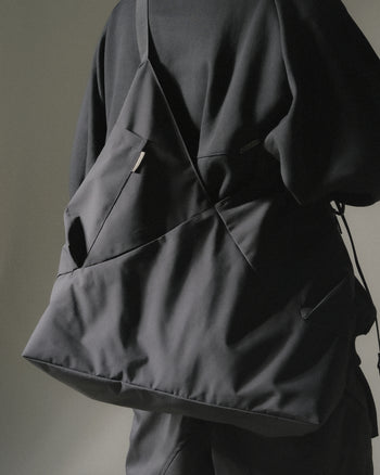 OCTO GAMBOL® -  Aura X-Curved Crossbody Bag