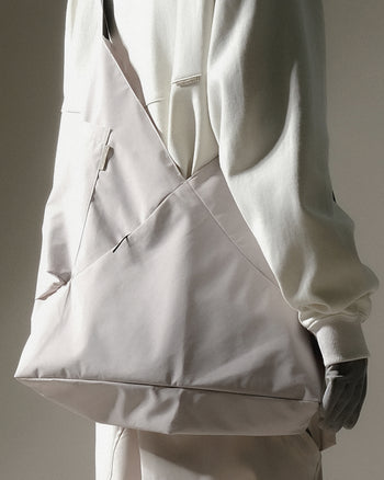 OCTO GAMBOL® -  Aura X-Curved Crossbody Bag