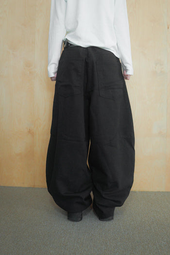 金屬排扣彎刀闊腿牛仔寬褲