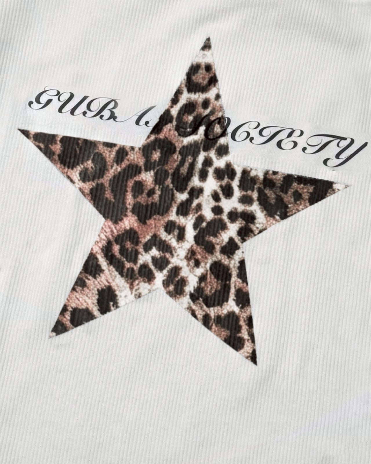 斜肩豹紋星星打底長袖上衣